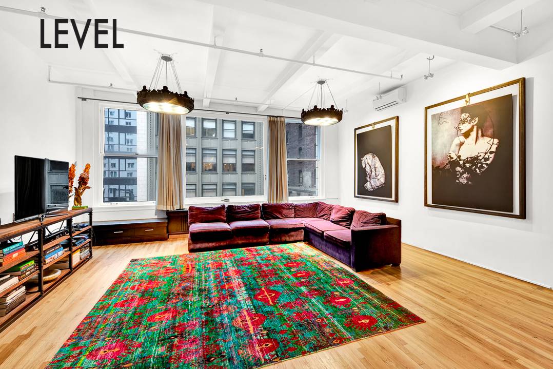 Prewar loft located steps from Bryant Park and amidst all the glamour of midtown !
