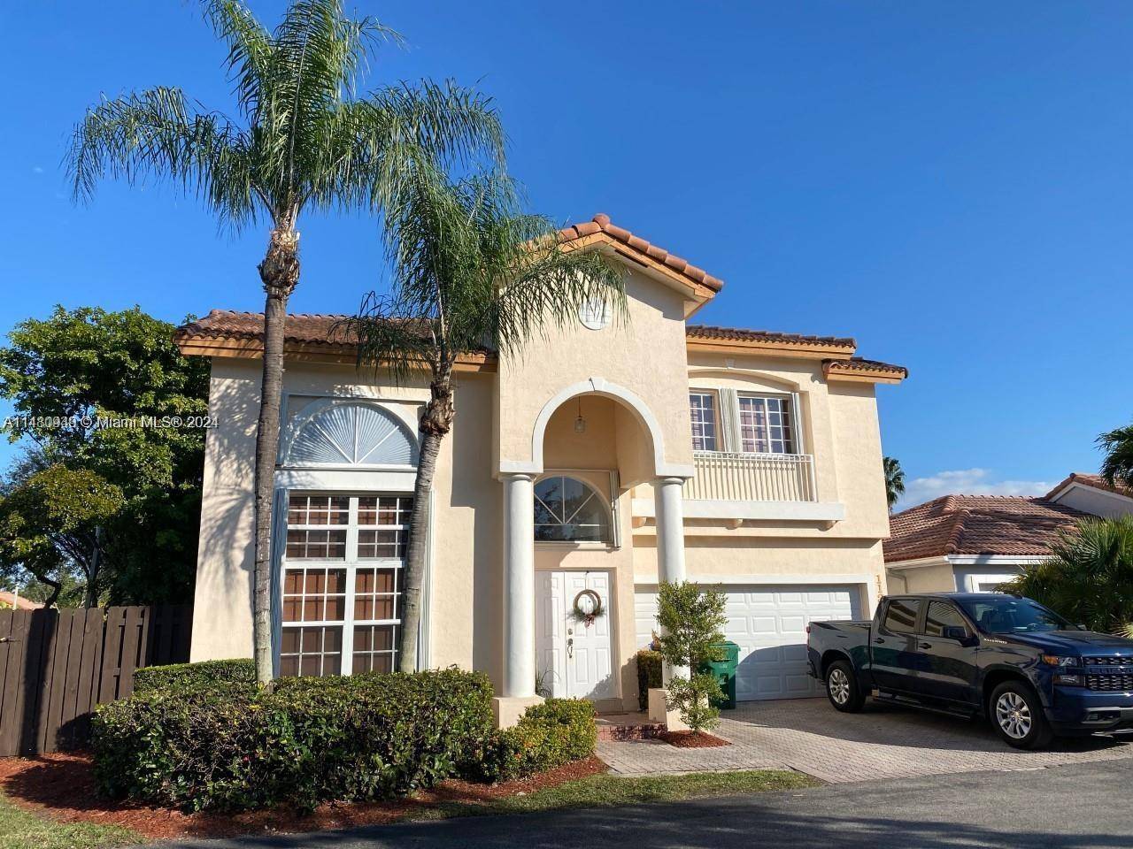 This is it ! A big and cozy 5 3 in prestigious Doral Isles with some upgrades, tile downstairs and hardwood floors upstairs in all bedrooms.