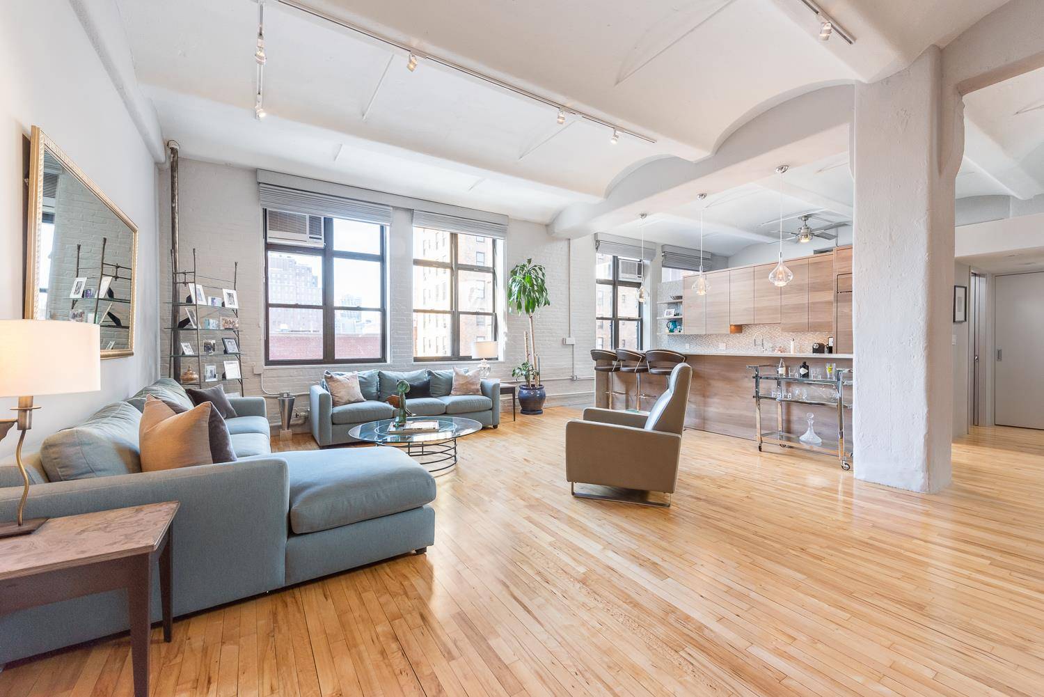 Upon entering this grand and gracious, recently renovated prewar loft beauty with 12 ft vaulted ceilings, huge Thermopane windows, and hand restored original pine floors, you'll instantly be impressed by ...