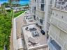 Birds-Eye View of Exceptional Patio (approximately 1,100 sq ft), private outdoor terrace. An impressive extension of the condo with abundant space for