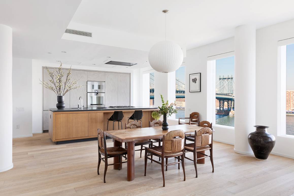 One of only four residences in the building with a private courtyard and private roof terrace, this trophy penthouse features stunning bridge, water and Manhattan views.