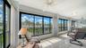 34' screened and glass lanai that runs the length of the unit.