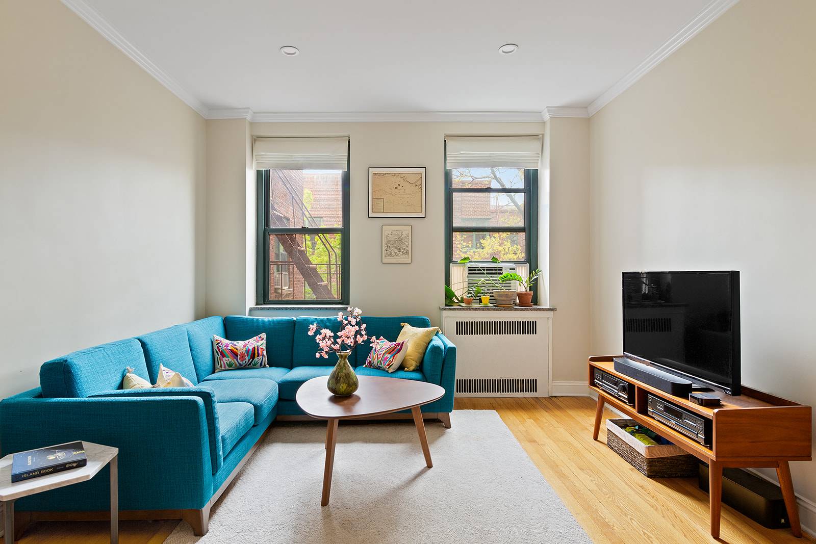 This sun splashed two bedroom one bathroom coop in the coveted pre war Dunolly Gardens complex has a contemporary vibe making it your perfect first home in Jackson Heights, the ...