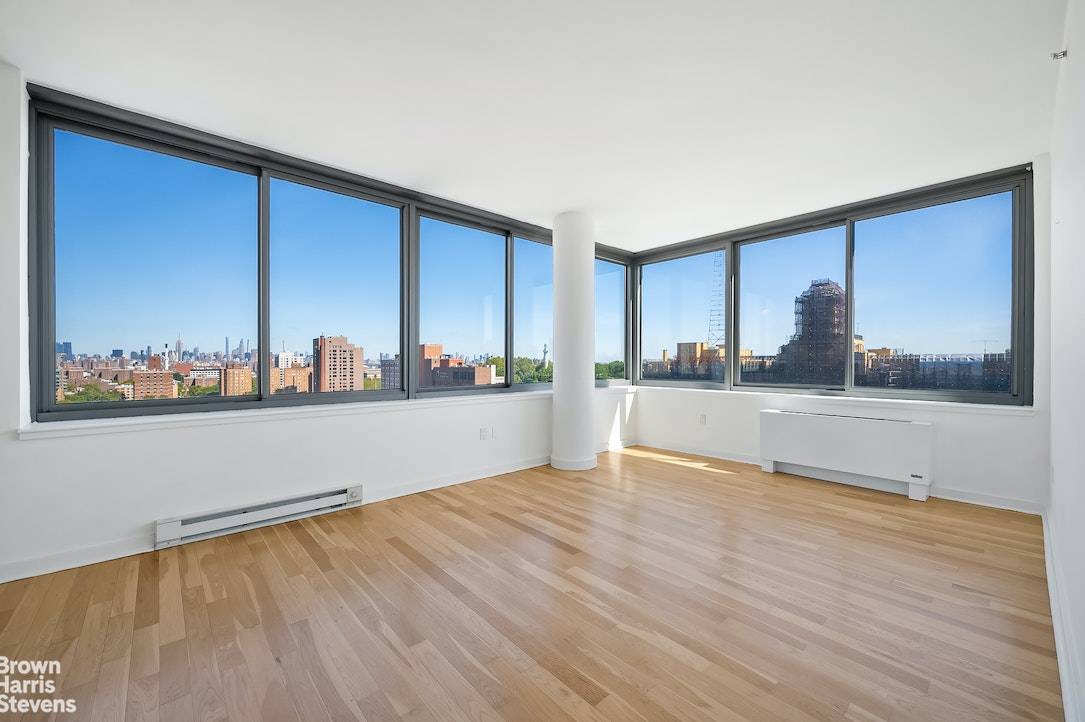 Stunningly bright corner apartment, with panoramic views of Brooklyn and the Manhattan skyline, in a full service condo building with an extremely convenient Fort Greene location.