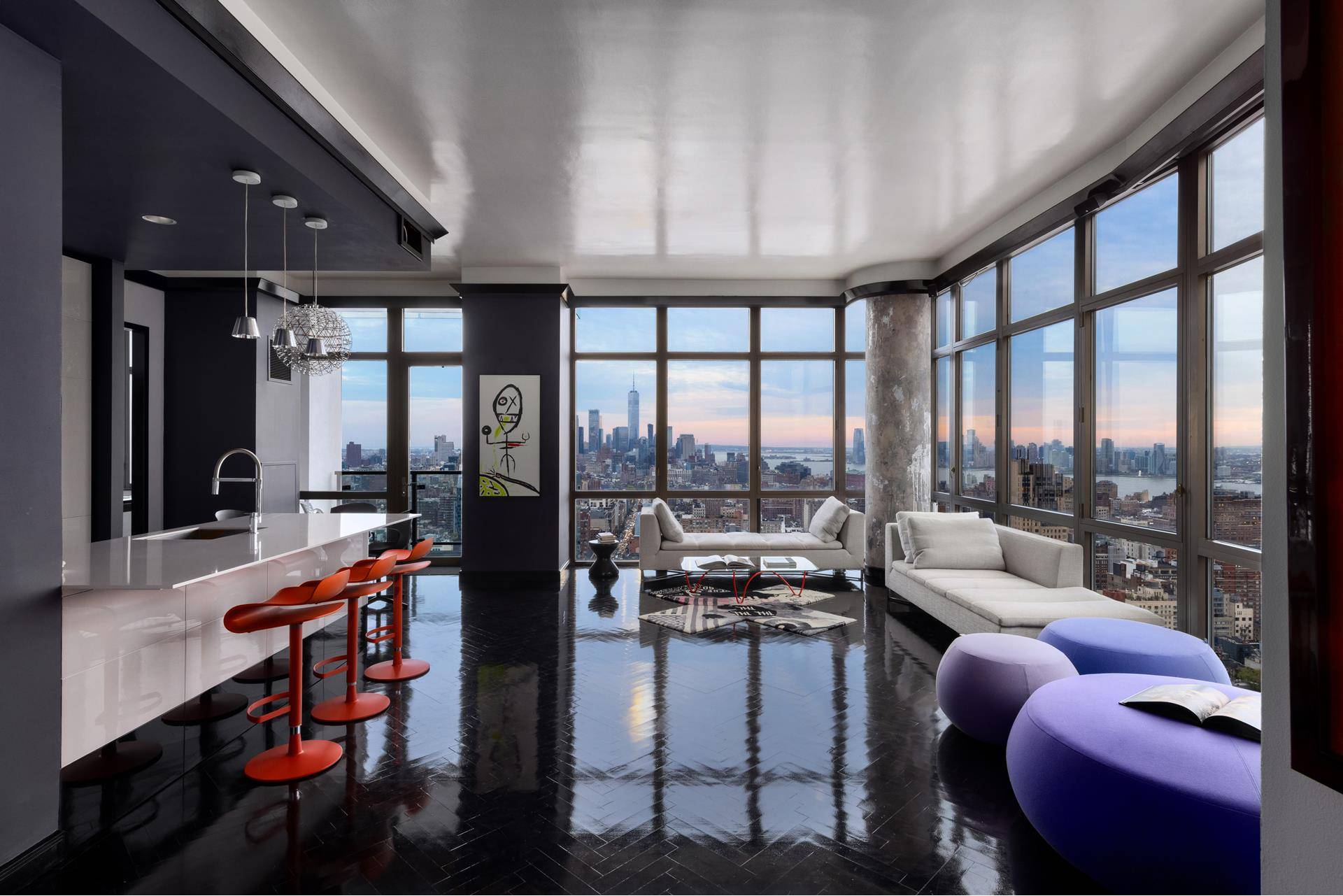 These spectacular panoramic views of New York City could be yours in this sun drenched penthouse in one of Chelsea's premiere luxury condominiums.