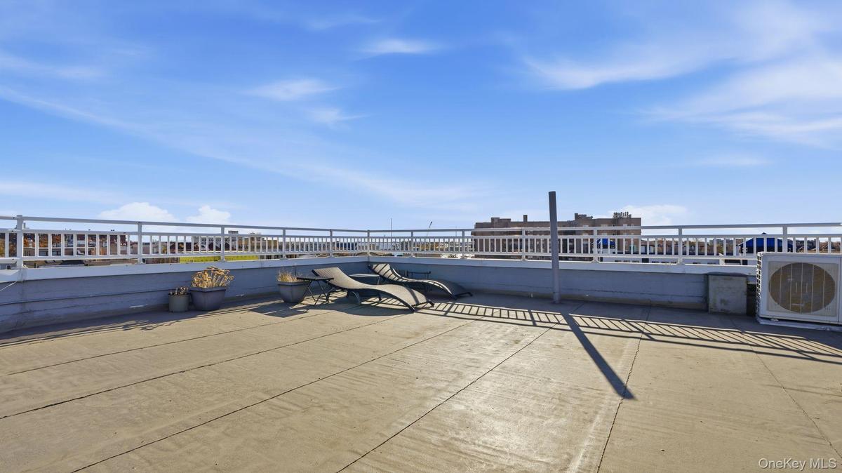 View of patio / terrace featuring a water view