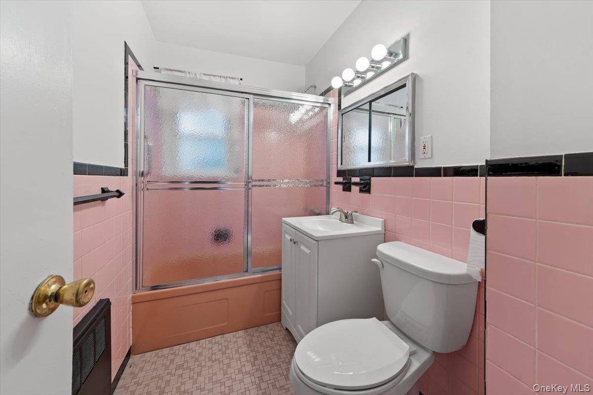 Immaculate bathroom with upgraded vanity and toilet and freshly painted.