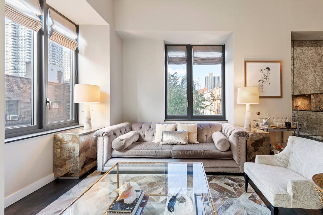 A private oasis awaits with magnificent sunlight and space in this remarkable two bedroom, two bathroom home in a full service Yorkville condo.