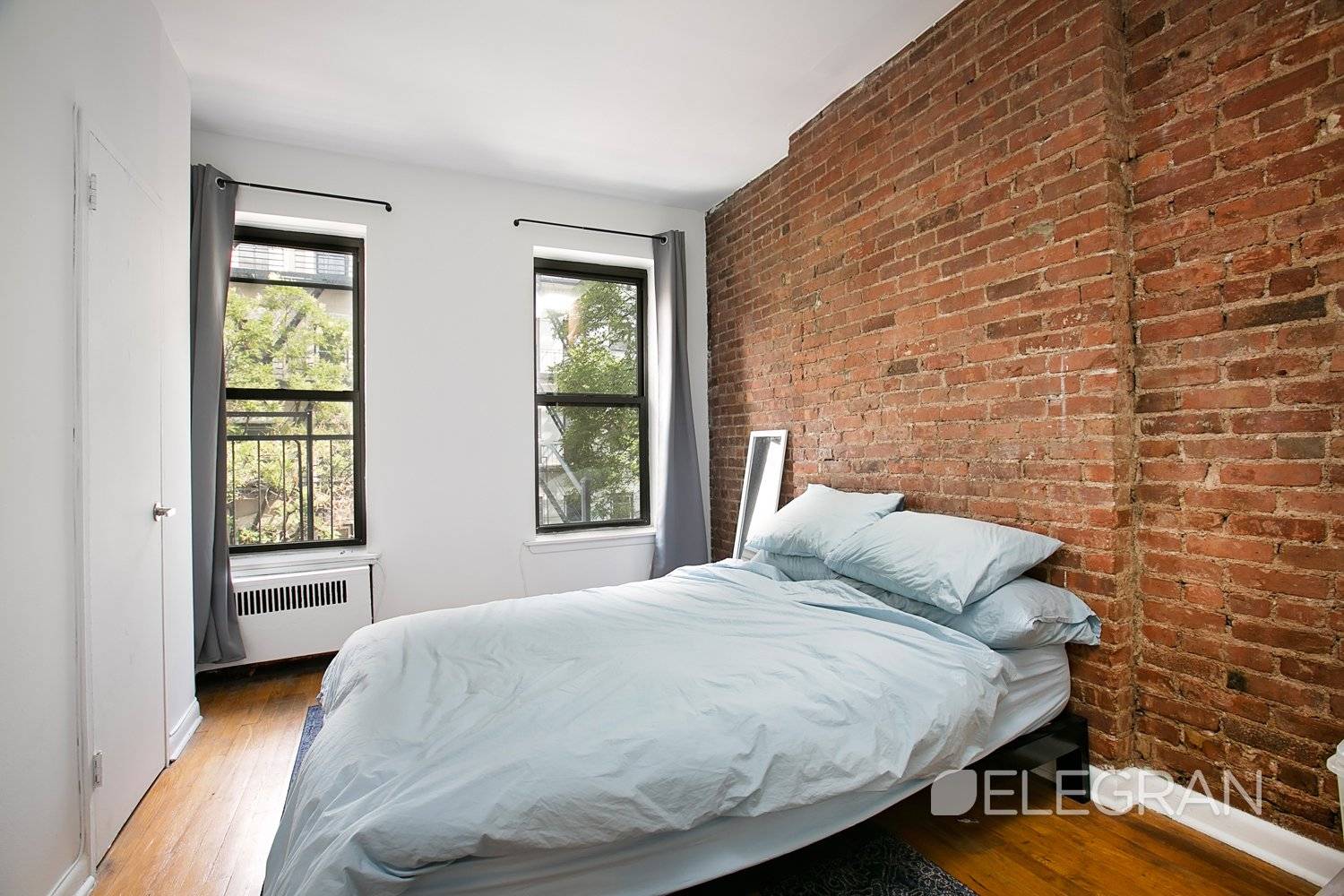 Available July 1st One bedroom featuring oversized windows and lots of natural light.