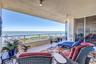 Residence Large tiled Patio Bay Views. Living Room and primar