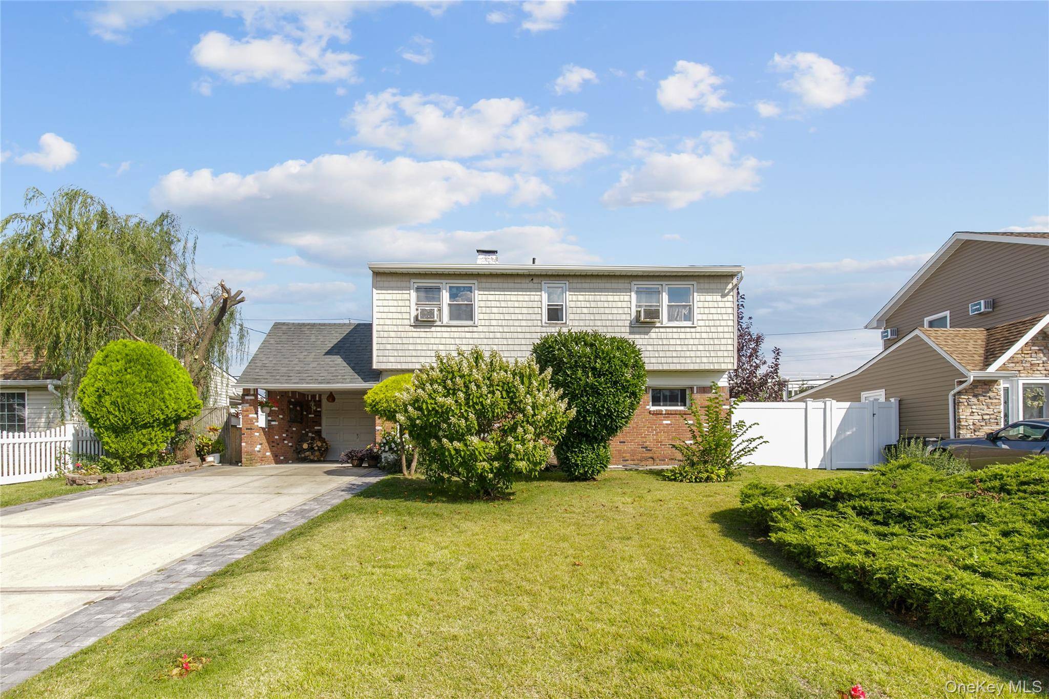 Expanded Four Bedroom Two Bath Cape Cod Style With Some Updates.