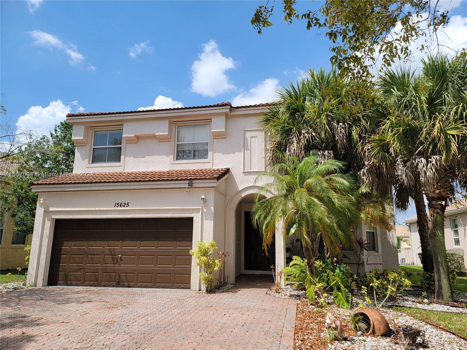 Fabulous home in a gated community in Riviera Isles with amazing lake view, 5 bedrooms 2.