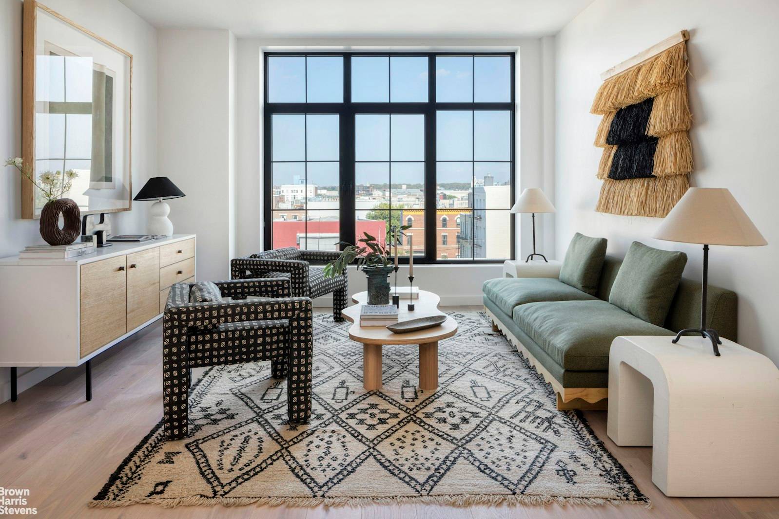 Welcome to The Lumin, a newly constructed boutique scale condominium featuring a traditional red brick fa ade with oversized warehousestyle windows.