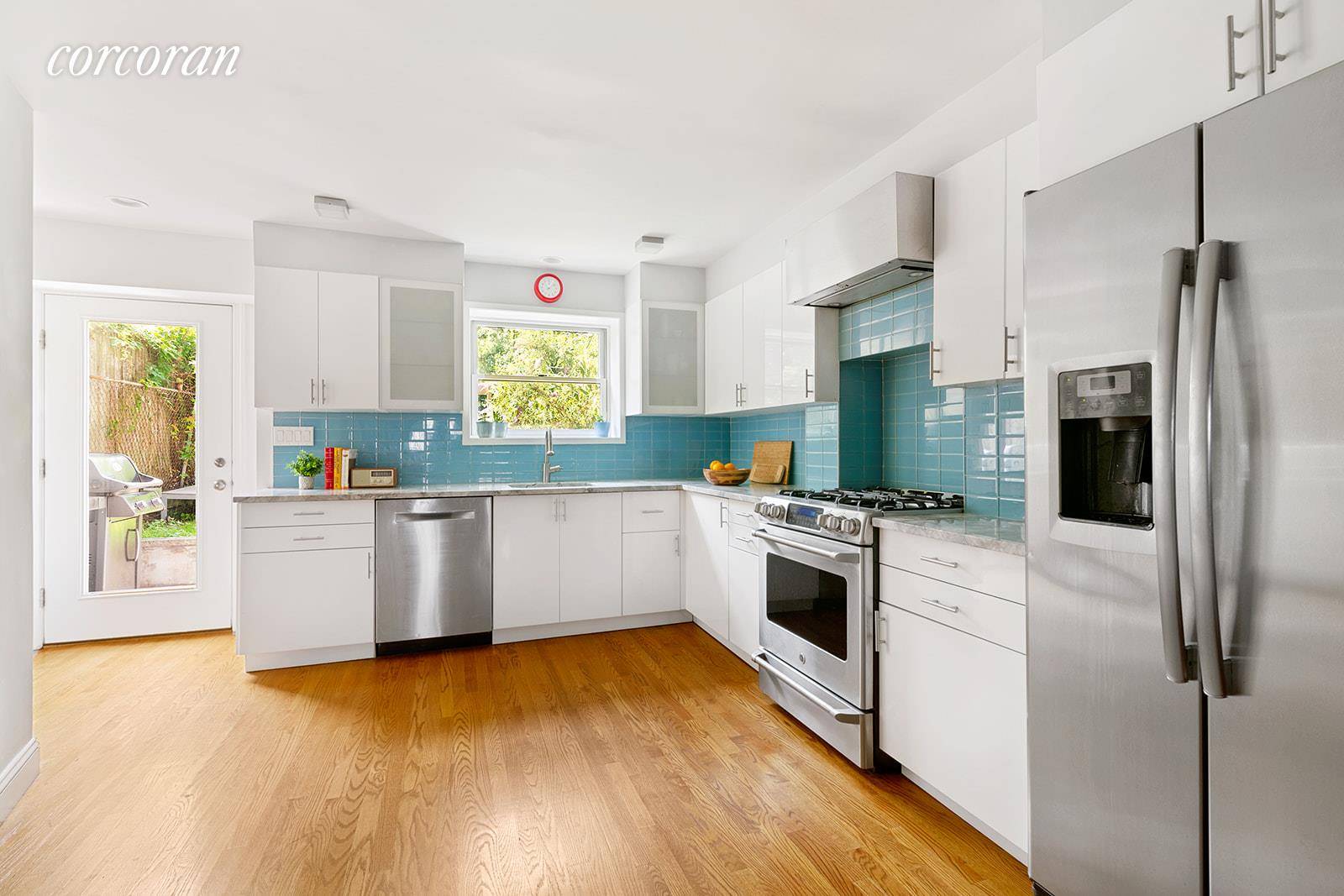 Finely renovated for modern tastes yet classically elegant with original features, this stunning 2 unit townhouse is currently configured as a single family home.