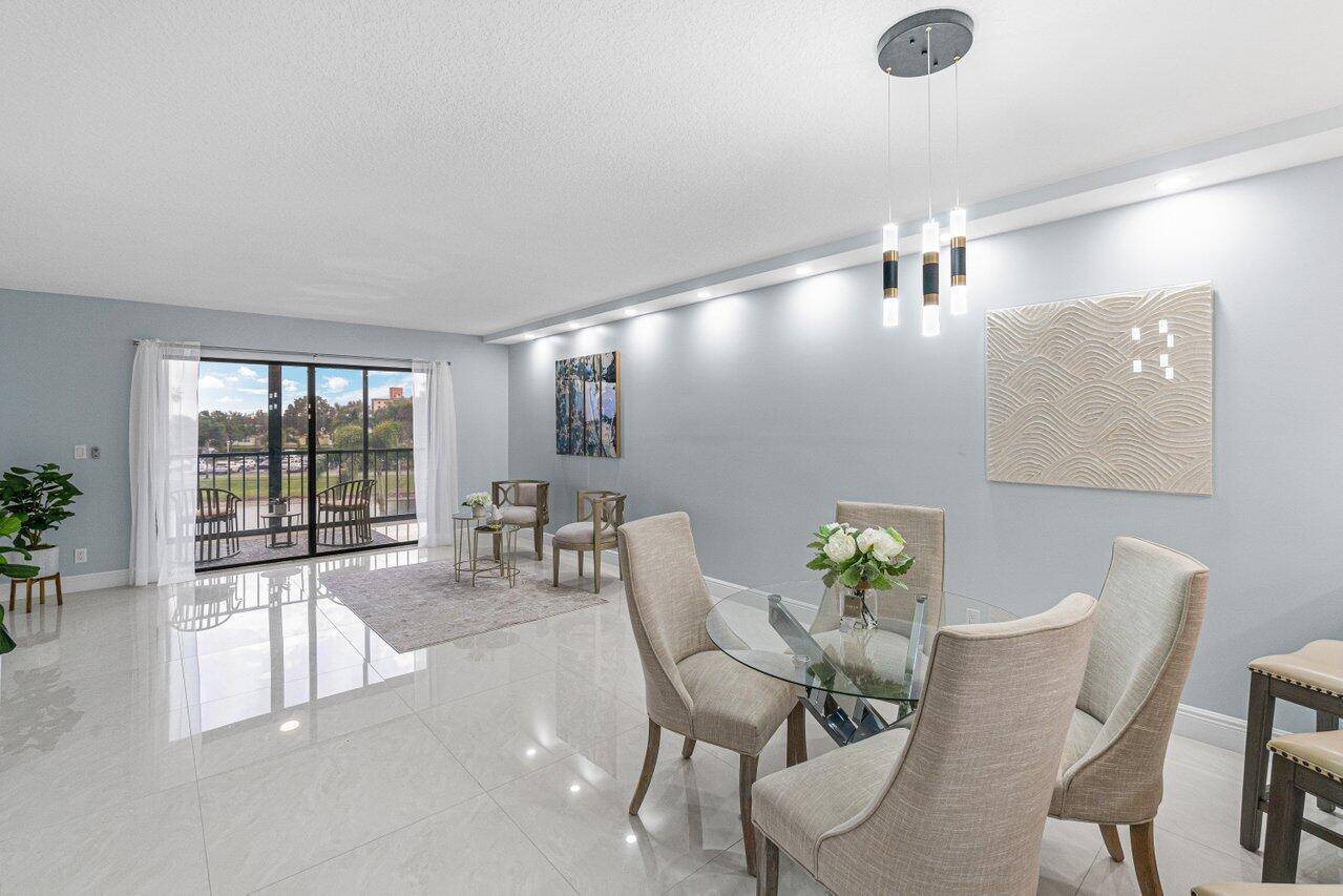ELEGANCE CLASS IN THIS STUNNING CONDO w HIGH END FINISHES FEATURING GOLD BLACK ACCENTS, LAKE VIEWS A NEW SHINING GEM CLUBHOUSE !