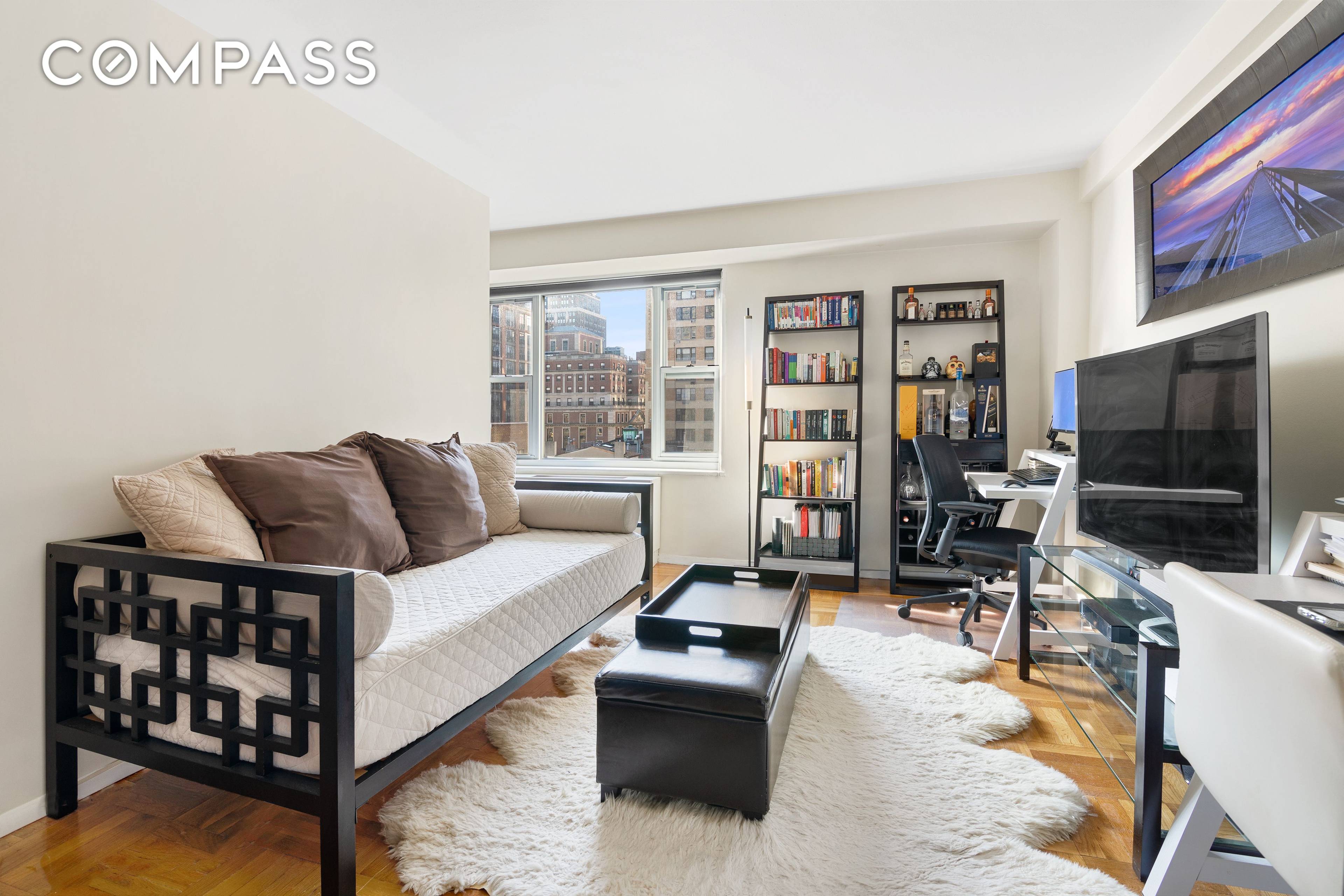 NEW PRICE HIGH FLOOR STUDIO w EXCEPTIONAL LIGHT amp ; OPEN CITY VIEWS incl A DIRECT VIEW OF THE EMPIRE STATE BUILDING !