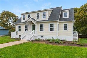 Nestled just walking distance from downtown Mystic, CT, this lovingly reimagined cape colonial located at 37 School Street embodies the perfect blend of classic charm and modern convenience.