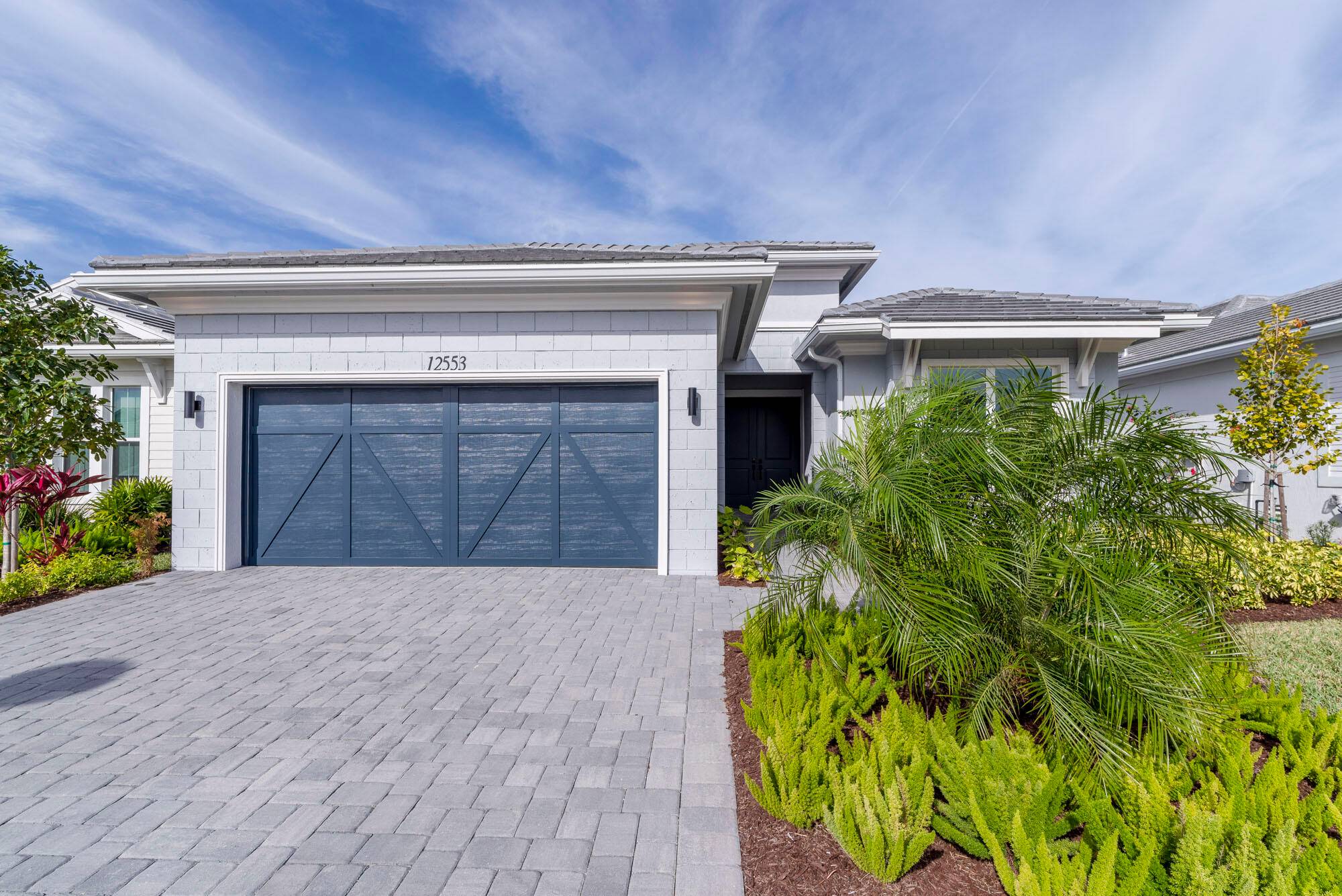 This must see exquisitely appointed newly 2023 built, never lived in home in the sought after gated community of Windgate at Avenir is now available.