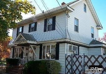 Large Center Hall Colonial in the heart of Franklin Square, hardwood floors throughout, formal dining room, living room with wood burning fireplace, bright and airy sitting room den, 4 bedrooms, ...