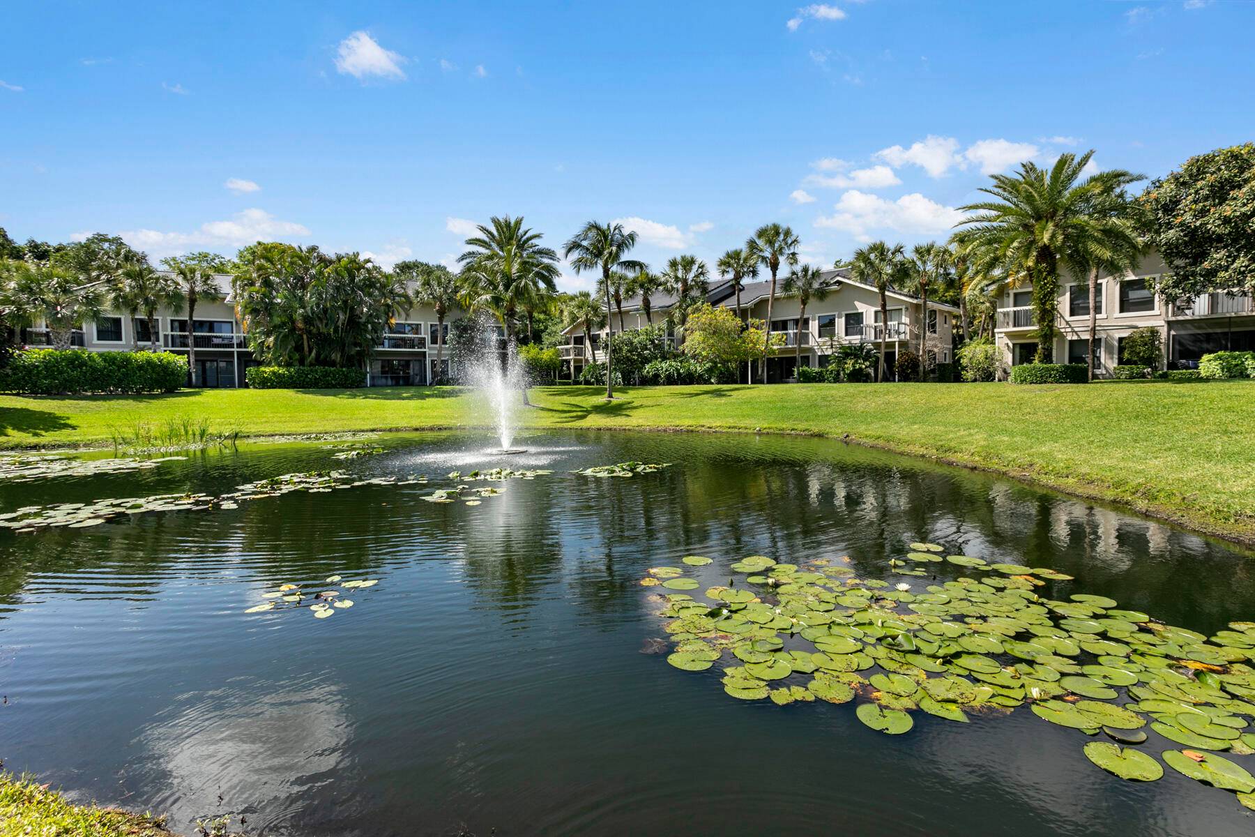 Introducing residence 450 451 at the Tennis Lodge's at Palm Beach Polo Golf Country Club.