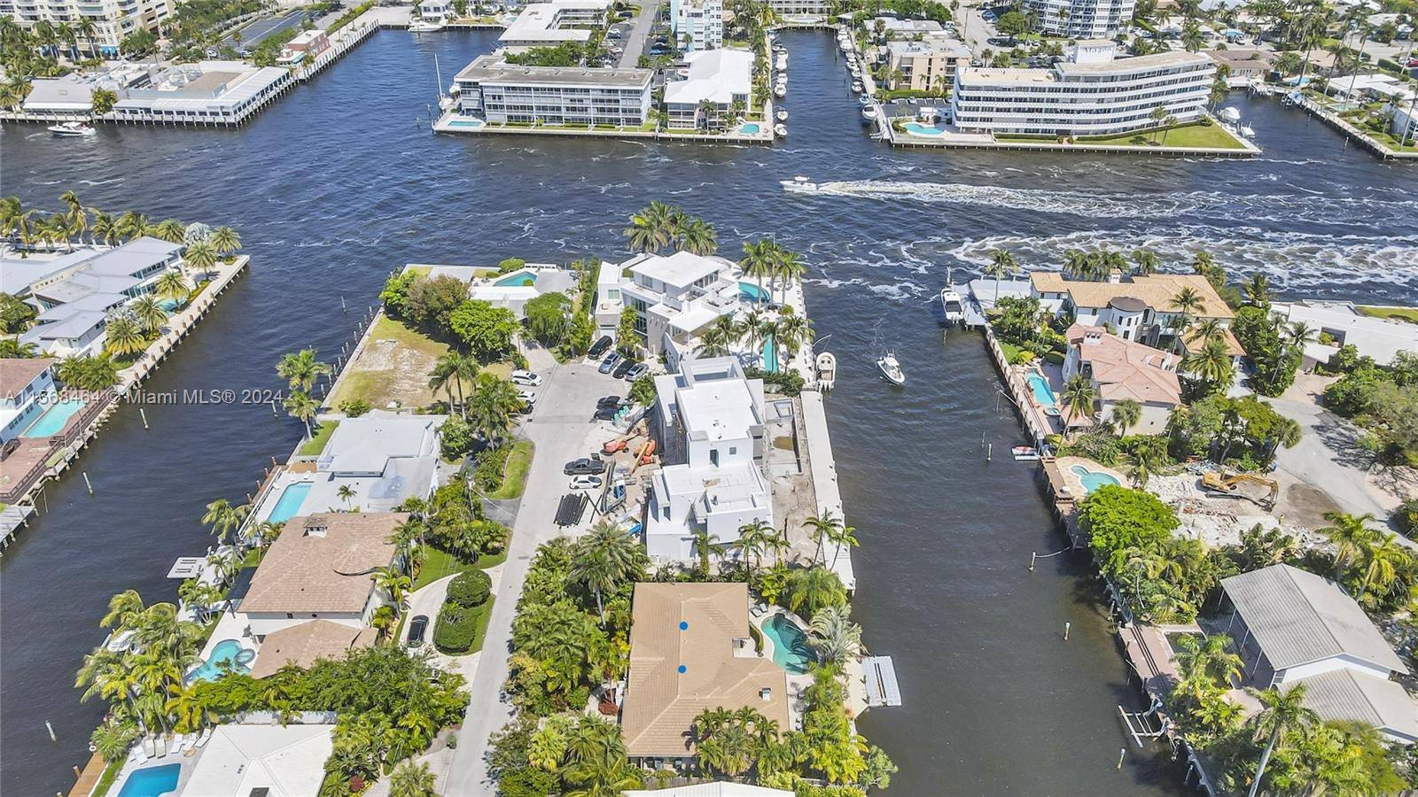 100' Deepwater NFB, pool, 2 car garage, located 2nd from point in Olde Coral Ridge.