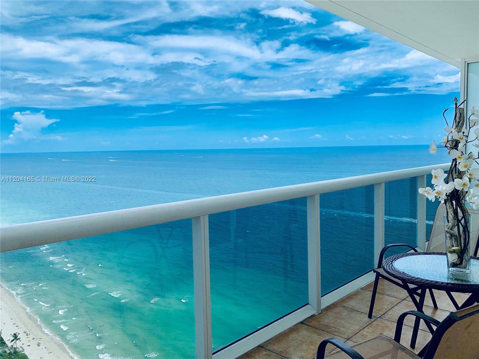 Beautiful fully furnished 2 2 apartment with breathtaking, panoramic ocean and intracoastal views.