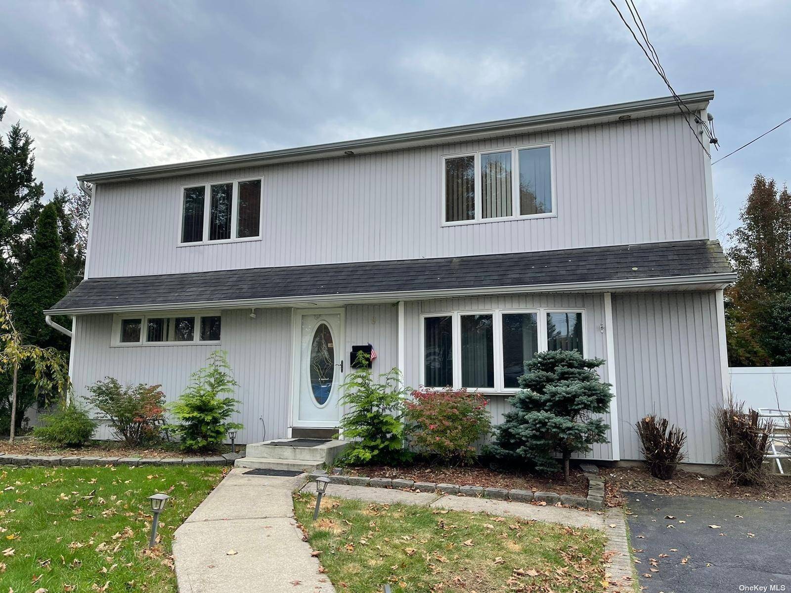 Beautiful, Spacious and recently renovated total 4 bedroom with 2 full bathroom apartment is available for rent in prime location of Commack.