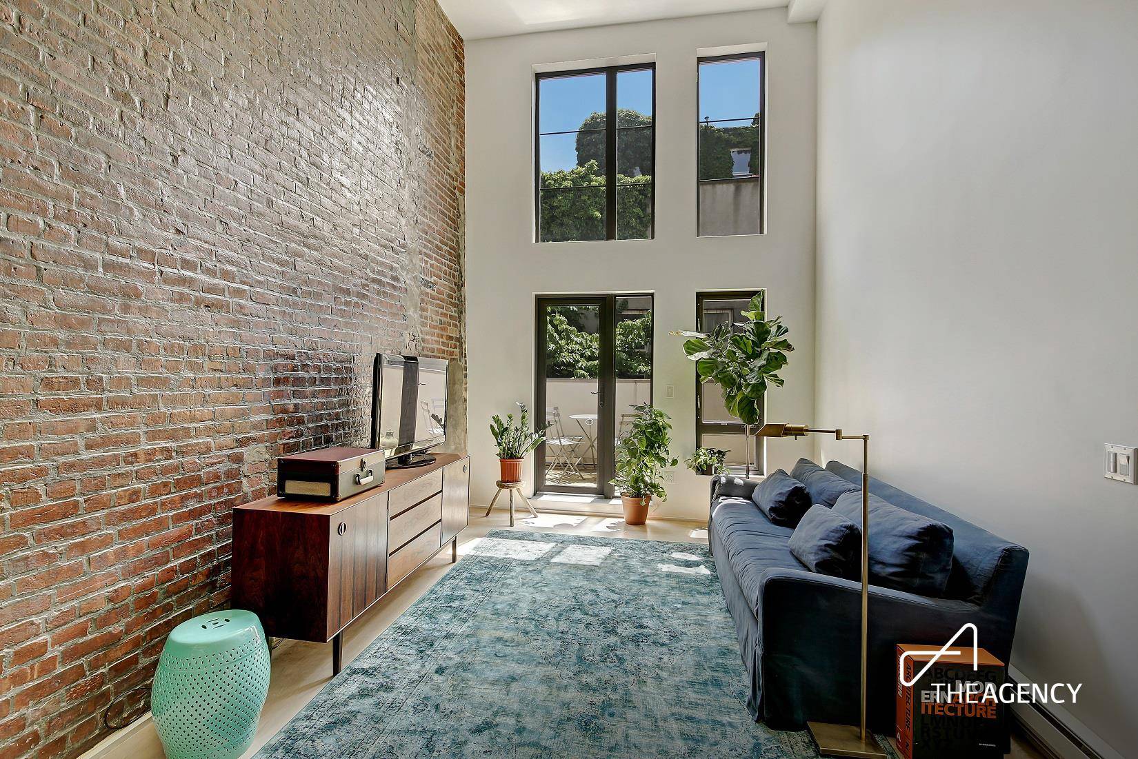Welcome home to an incredible duplex loft apartment with a private TERRACE in south Williamsburg.