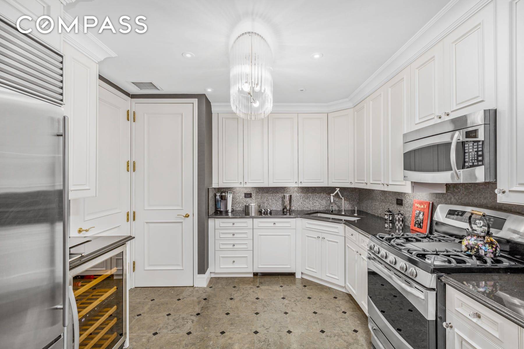 Stunning expansive three bedroom three bathroom home perched on the 15th floor at the Beekman Regent with in unit Washer Dryer.