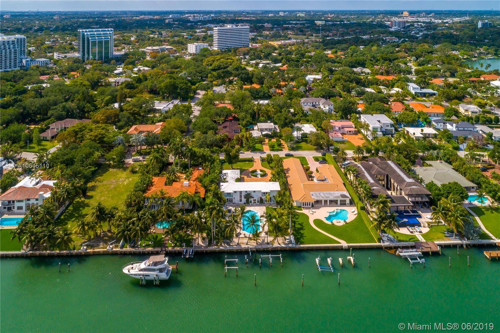 Located Within The Prestigious Neighborhood Of Bay Point, This Home Features Incredible Views Of The Open Bay, Downtown, And Has Plenty Of Water Frontage For A Yacht.
