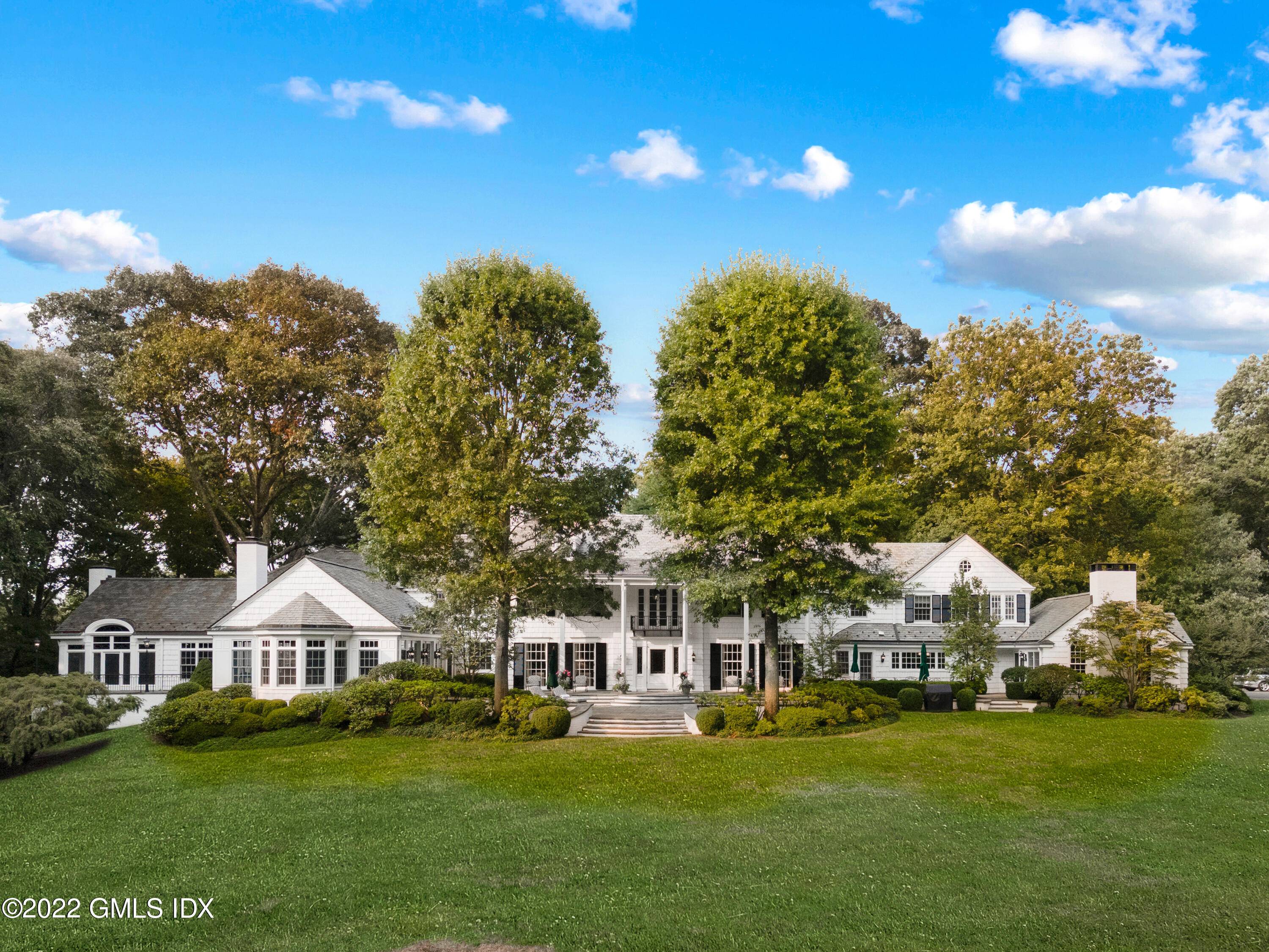 Meticulously renovated New Canaan compound exudes quintessential New England elegance combined w every modern amenity mechanical one could imagine.