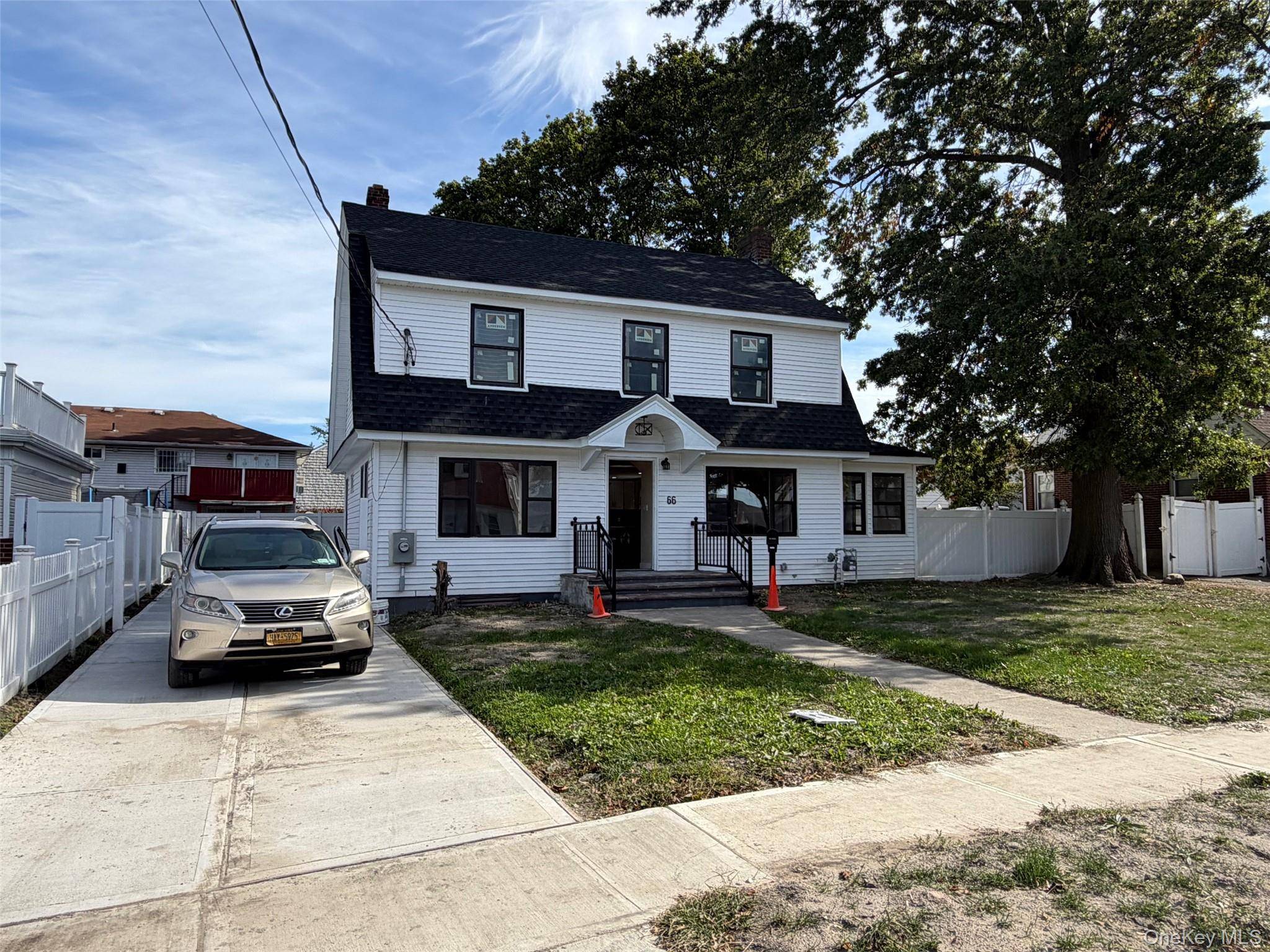 completely renovated with hardwood floor new kitchen and tile floor.