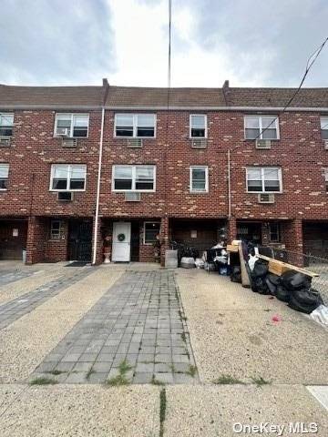 3 family solid brick residence in the heart of Flushing !
