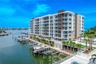 Marina Bay 880 offers breathtaking waterfront views, showcased through expansive floor-to-ceiling windows and sleek glass railings that ensure an unin