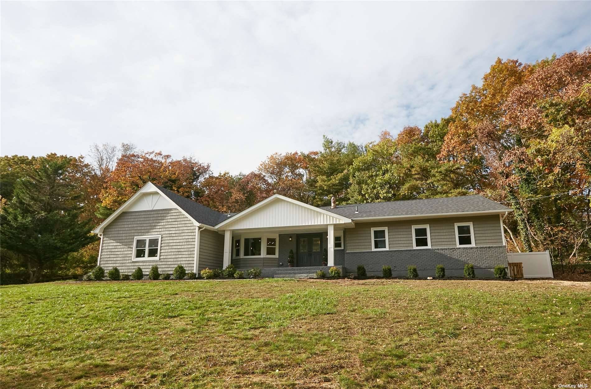 Classic ranch on a private 2 acre lot with in ground pool and full finished basement.