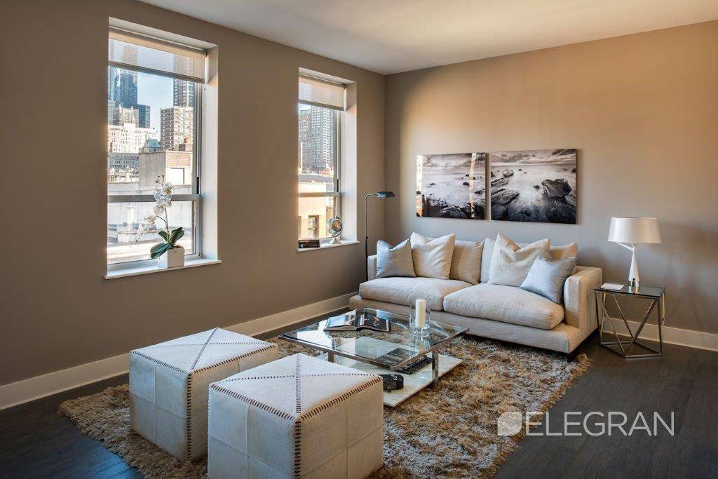 This spacious and bright 1 bedroom is situated in Nine52, a highly coveted luxury tower centrally located in Hell s Kitchen !