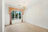 Separate dining room with chandelier included