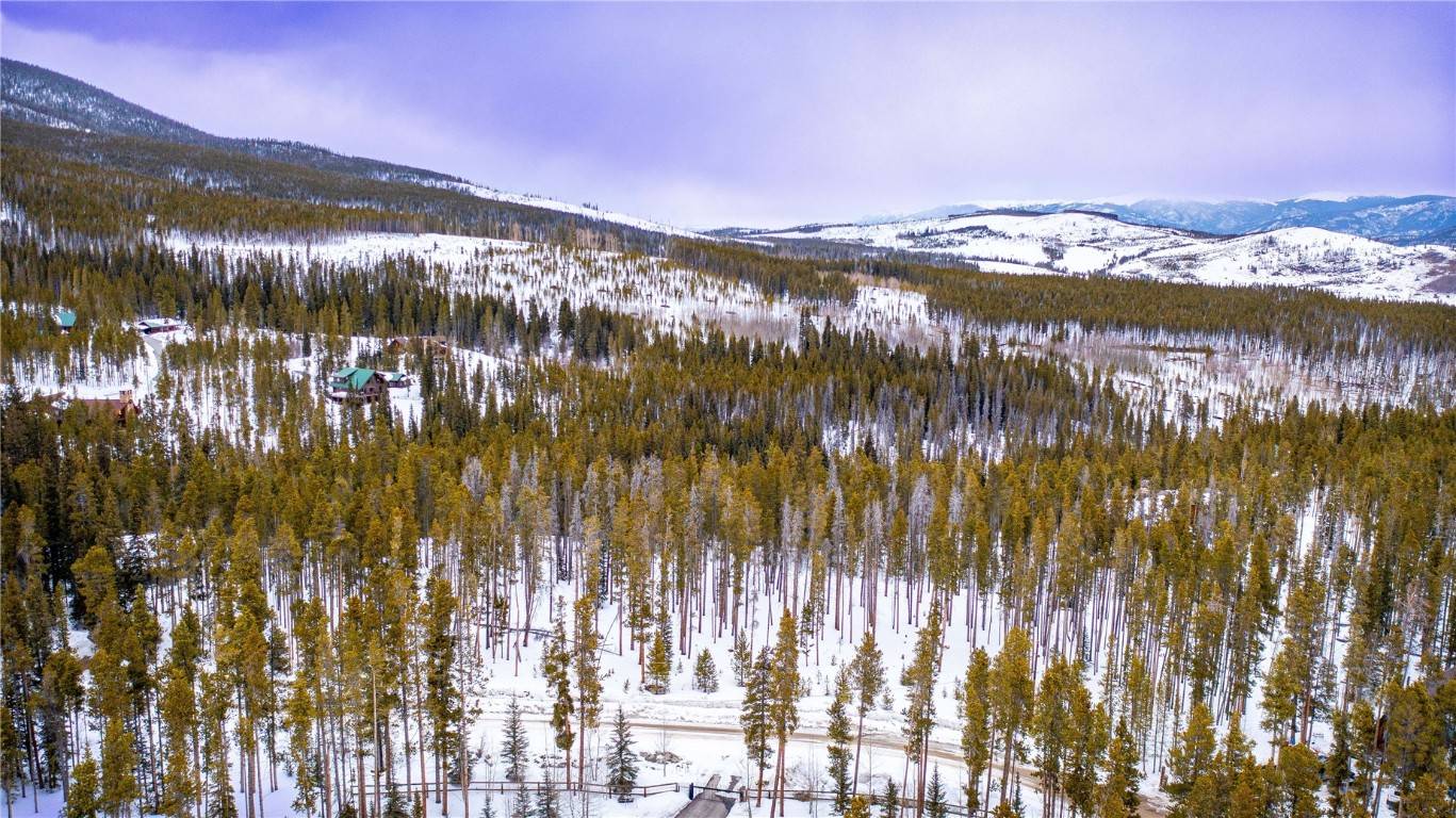 Embrace the epitome of mountain living with this extraordinary 1 acre vacant lot nestled just minutes from Breckenridge, Colorado.