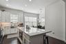 Kitchen island with microwave drawer