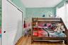 Bedroom_#4_pic_#2_closet_doors_to_left