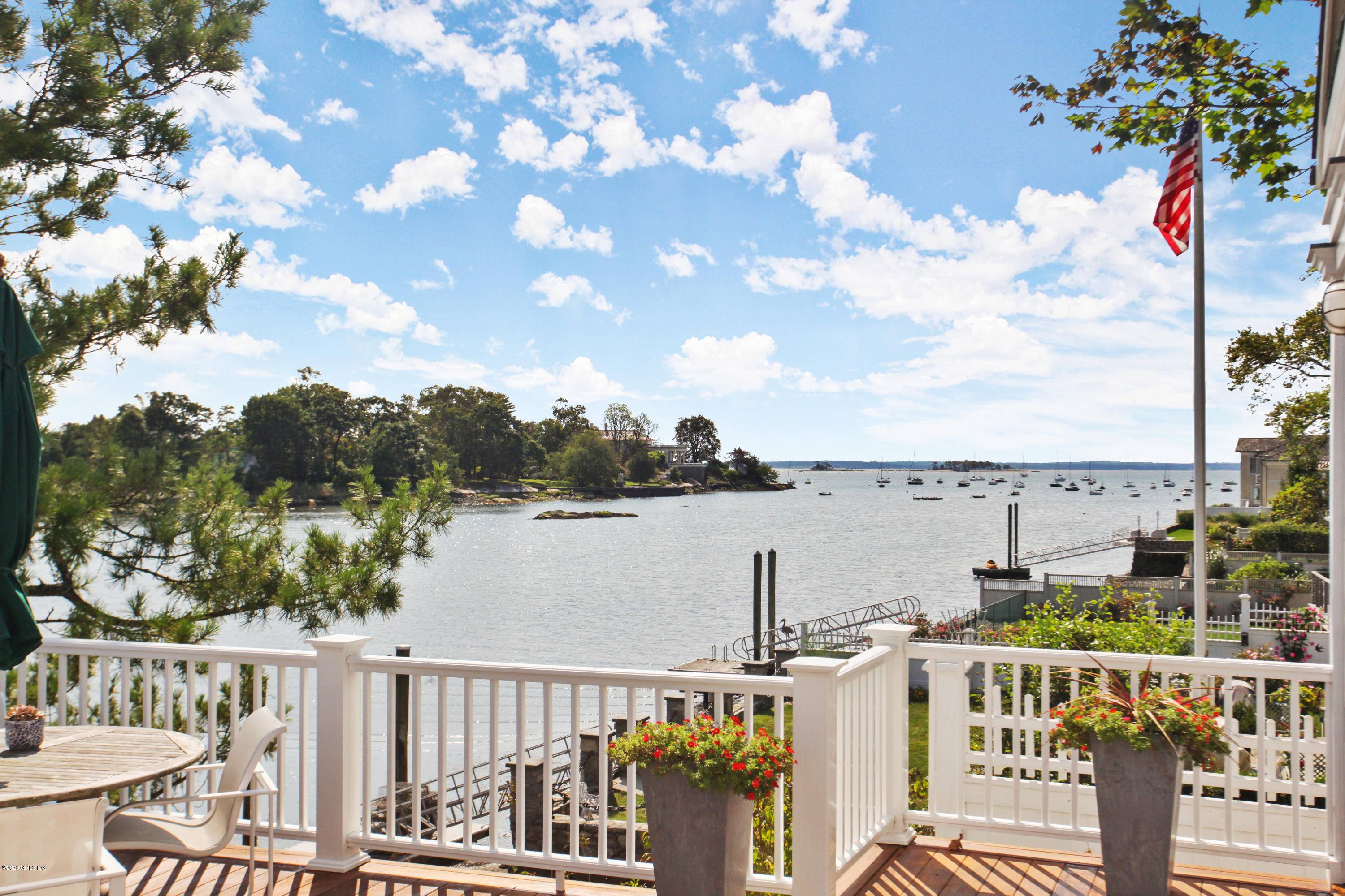 One of a kind DIRECT WATERFRONT with broad sweeping views of Long Island Sound on picturesque Smith Cove on Steamboat Rd.
