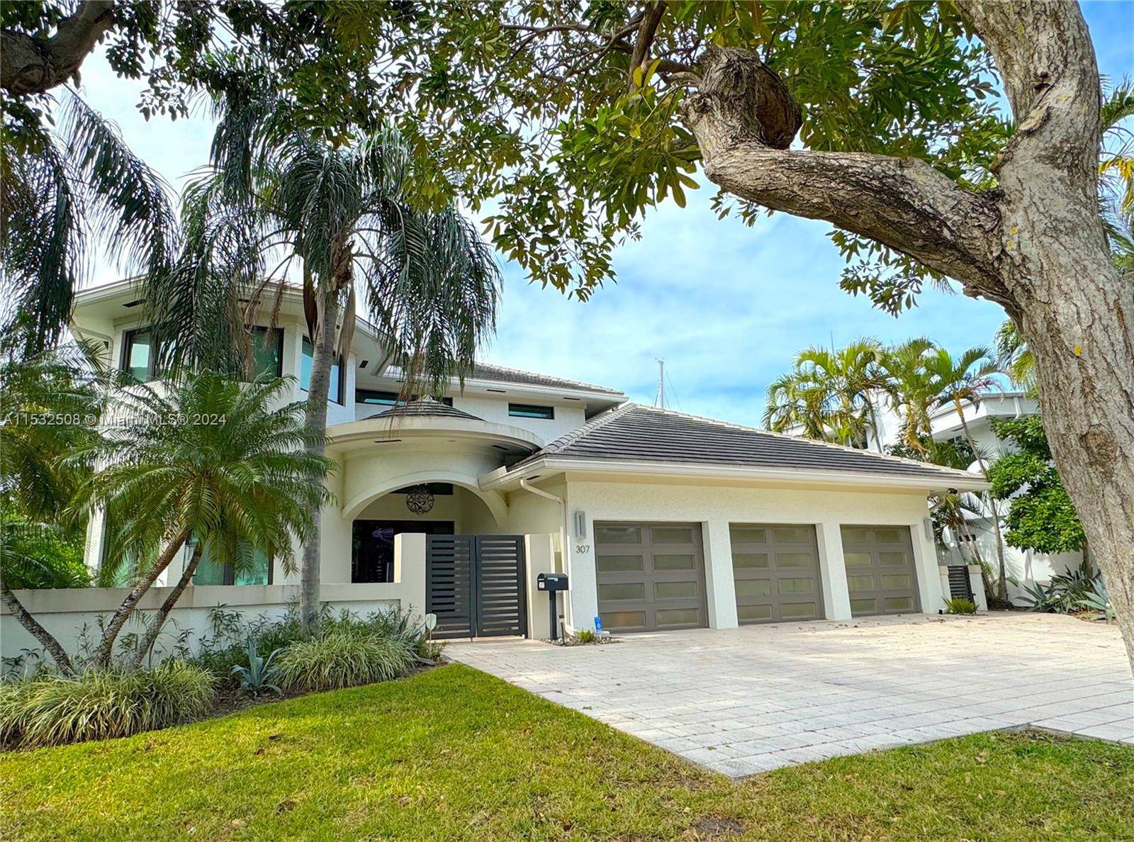 This exquisite smart home features a modern design with an open floor plan, high ceilings, loft area, Control4 automation, large island in kitchen with natural gas, seamless access to the ...