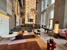 Common area featuring a high ceiling