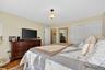 Bedroom featuring a closet and wood finished floors