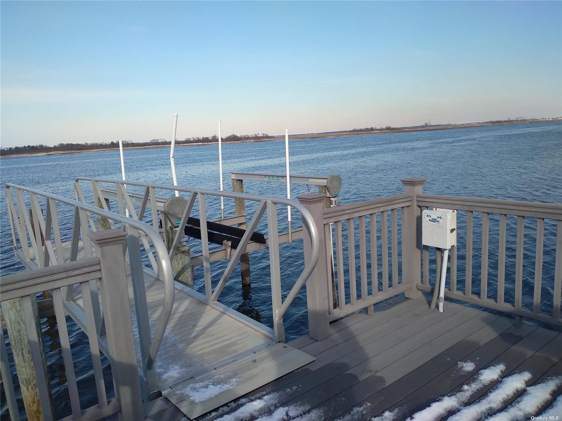 Come see this lucky home which gives you a 270 view of the water.