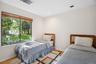 Bedroom with wood finished floors and recessed lighting