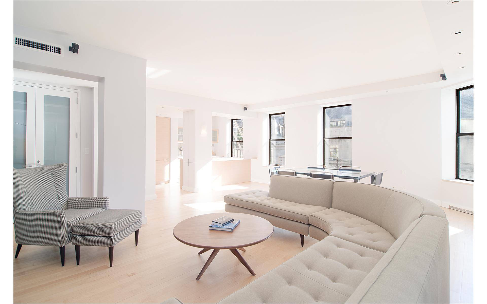 High end renovation in 28 unit building boasts 9'8' ceilings, sweeping exposures south and west thru 2 pane windows.