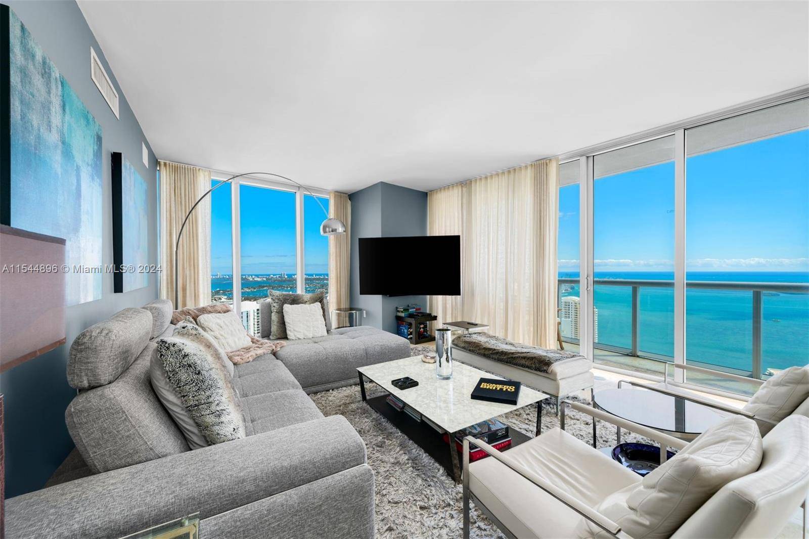 A magnificent combination residence located on the 53rd floor of Icon Brickell Tower 1 w 5 bedrooms, 4.