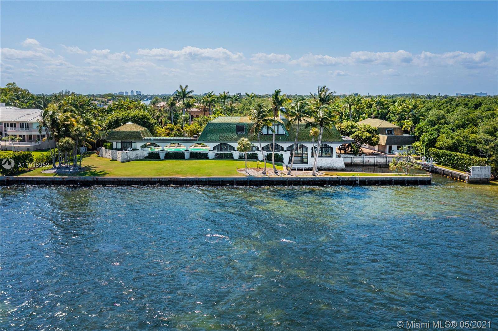 This magnificent gated 3 story bayfront estate located in exclusive Gables Estates sits directly on Biscayne Bay on an impressive 114, 882 SF lot with 340 FT of WF, a ...