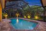 Evening accent lighting surrounds pool (virutally enhanced photo)